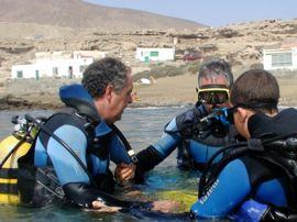 Practicing skills in the calm waters close to the beach as part of a PADI diving course in Gran Canaria